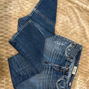 Mek: A Well Traveled Denim Co. Dark Blue Boot-Cut Jeans